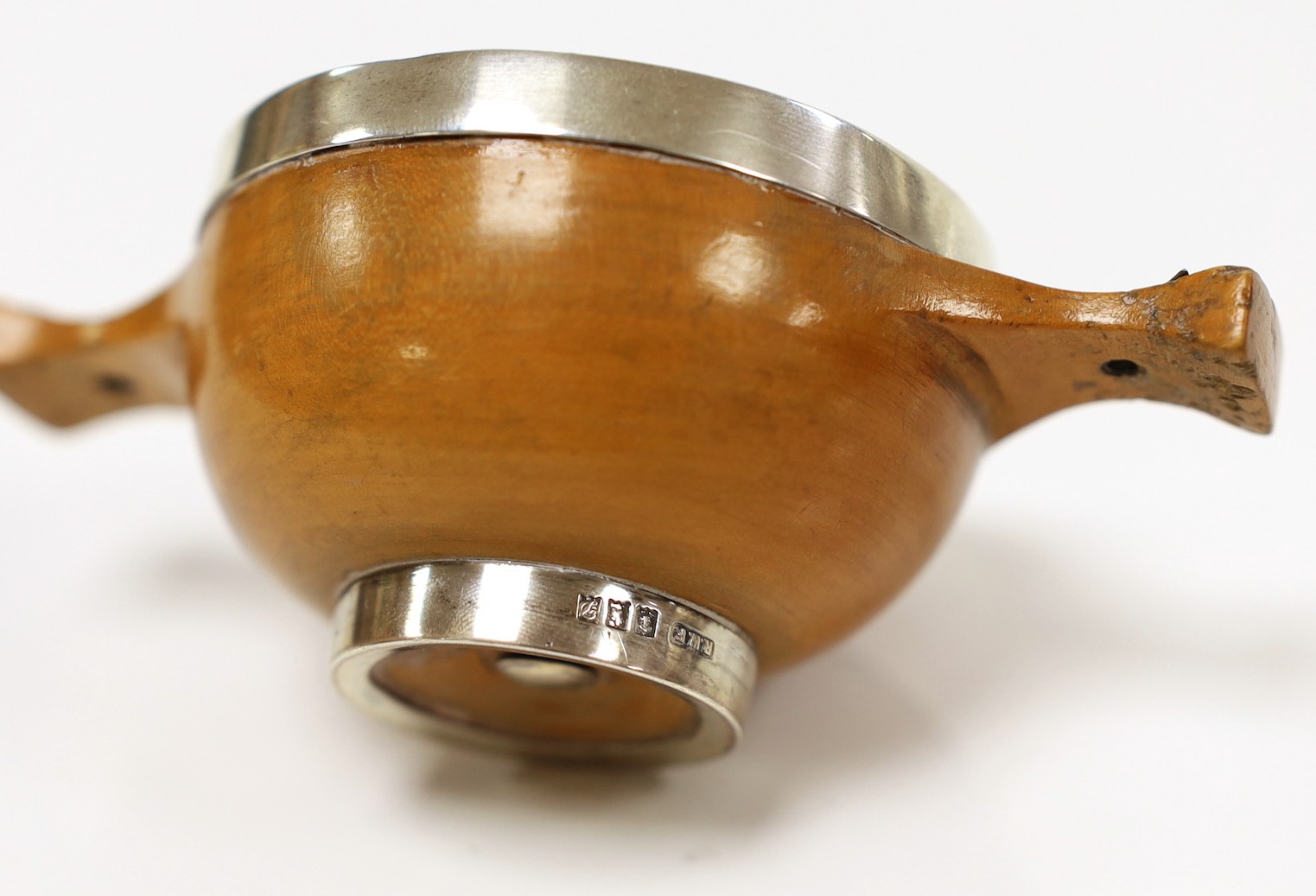 A late Victorian Scottish silver mounted sycamore? quaich, R.W. Forsyth Ltd, Glasgow, 1900, inscribed 'Scuabasi', 11.2cm.